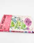 Champignon no Majo Volume 5 side view with spine and obi
