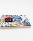 Fire Emblem: Genealogy of the Holy War light novel side view showing page discoloration