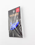 Side view of the Ocarina Pin sold at Nintendo Tokyo