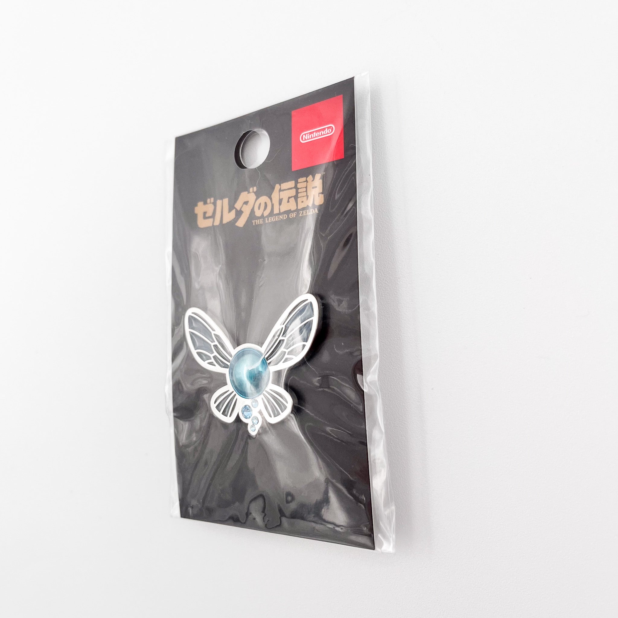 side view of the navi pin sold at Nintendo Tokyo in Japan