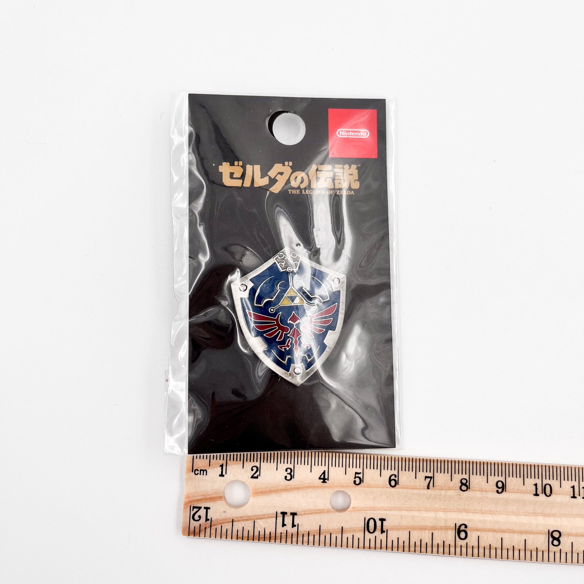 The Legend of Zelda: Hylian Shield Pin Packaging Width 6cm